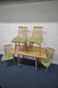 AN OAK EFFECT DROP LEAF KITCHEN TABLE, raised on cylindrical tapered legs, open width 123cm x closed