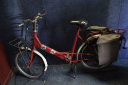 A PASHLEY POSTAL WORKERS BIKE with rear rack and paniers, front rack spindle brakes front and