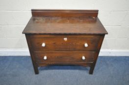 AN EARLY 20TH CENTURY OAK CHEST OF TWO DRAWERS, width 92cm x depth 45cm x height 87cm, condition