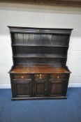A 20TH CENTURY GEORGIAN STYLE OAK DRESSER, the three tier plate rack atop a base with thee