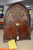 A VINTAGE BUSH RADIO MODEL AC3, early 20th century, moulded imitation wood fret, 'Cathedral'