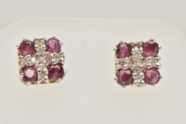 A PAIR OF RUBY AND DIAMOND SET STUD EARRINGS, each of a square form, set with four circular cut
