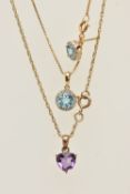 TWO BOXED PENDANT NECKLACES AND A SINGLE EARRING, the first a blue topaz and diamond circular form