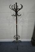 A BROWN PAINTED HAT / COAT STAND, with a rotating six arm top, height 180cm, condition report: