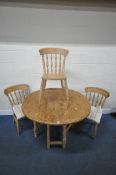 A 20TH CENTURY PINE GATE LEG TABLE, raised on block and turned supports, united by stretchers,