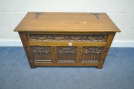 A 20TH CENTURY OAK BLANKET CHEST, with ecclesiastical carved details, width 106cm x depth 48cm x