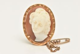 A LATE 19TH CENTURY 18CT GOLD CAMEO BROOCH, the high relief shell cameo, carved to depict an elegant