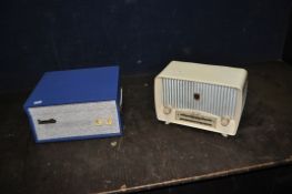 A DANSETTE POPULAR RECORD PLAYER in blue and grey along with an Ultra valve radio in cream