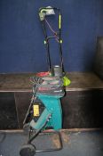 A BOSCH AXT2000HP GARDEN SHREDDER and a Gardening Essentials lawn mower (both PAT pass and