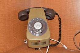 A WALL MOUNTED ATE ROTARY DIAL PHONE marked N1220A1 to the reverse, an unmarked handset, rewired for