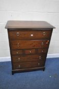 A STAG MINSTREL TALL BOY, fitted with seven assorted drawers, width 82cm x depth 47cm x height