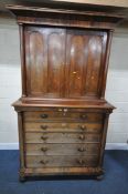 A 19TH CENTURY MAHOGANY SECRETAIRE BOOKCASE, the double cupboard doors enclosing two shelves, atop a