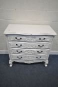 A WHITE PAINTED SERPENTINE CHEST OF FOUR LONG DRAWERS, with scrolled and foliate details, raised
