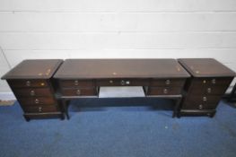 A STAG MINSTREL DRESSING TABLE, fitted with five assorted drawers, raised on square tapered legs,