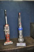 A SHARK ROCKET UPRIGHT VACUUM CLEANER and a Dyson small ball vacuum cleaner (both PAT pass and