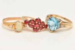 THREE GEM SET RINGS, three yellow gold rings, each set with coloured semi-precious stones,