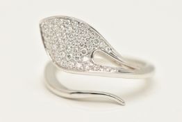 A CONTEMPORARY DIAMOND DRESS RING, a white metal leaf form bypass ring, pave set with round