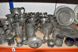 A COLLECTION OF PEWTER ITEMS to include four plates, five half pint tankards, four shakers, four
