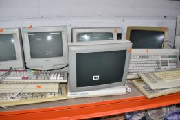 A LARGE QUANTITY OF VINTAGE COMPUTER EQUIPMENT to include six monitors to include manufacturers