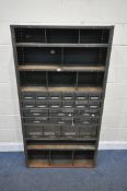 A GREEN PAINTED INDUSTRIAL SHELVING UNIT, with twenty-two assorted drawers, width 92cm x depth
