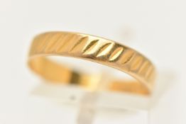 A 22CT GOLD TEXTURED BAND RING, approximate band width 3.5mm, hallmarked 22ct London, misshapen