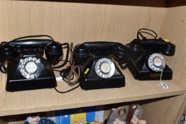 THREE BLACK GEC BAKELITE 'GECOPHONE' TELEPHONES all with rotary dials, one marked 'The Reliance