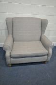 A NEXT GREY UPHOLSTERED WIDE WING BACK ARMCHAIR, width 119cm x depth 89cm x height 97cm, condition