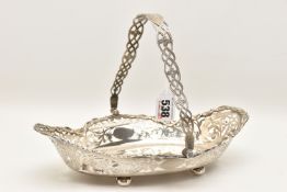 AN EARLY 20TH CENTURY SILVER BASKET TRAY WITH SWING HANDLE, of an oval form, pierced rim with a