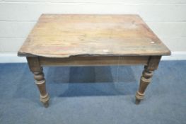 AN EARLY 20TH CENTURY PINE TOP SCRUB TABLE, with a single frieze drawer to one end, raised on turned