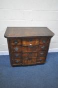 AN 18TH CENTURY WALNUT DUTCH BREAKFRONT CHEST OF FOUR LONG DRAWERS, the top surface has been adapted