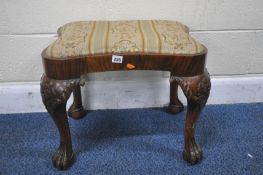 AN EARLY 20TH CENTURY REPRODUCTION GEORGIAN STYLE WALNUT STOOL, with needlework upholstery,
