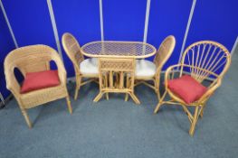 A RATTAN OVAL TABLE, with a glass insert, width 100cm x depth 55cm x height 74cm, a pair of