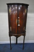 A GEORGIAN OAK BOW FRONT CORNER CUPBOARD, with Corinthian pillar style details, the double