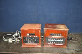 TWO MID 20th CENTURY TELEPHONIC SWITCH BOXES both in mahogany cases, one with 7 bands of switches