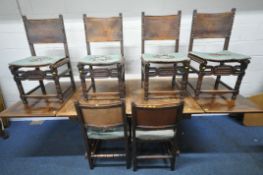 AN EARLY 20TH CENTURY OAK DRAW LEAF DINING TABLE, raised on large bulbous supports and shaped