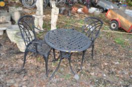 A MODERN CAST ALUMINIUM GARDEN TABLE AND TWO CHAIRS, with lattice effect top and seats, table