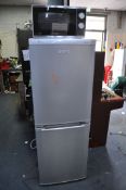 A BEKO CDA539FS FRIDGE FREEZER, width 55cm, depth 60cm, height 152cm, along with a Morphy Richards