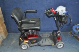 AN APEX RAPID MOBILITY SCOOTER, with one key, charger and spare coloured panels (PAT pass and