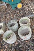 A SET OF FOUR CONCRETE PLANTERS, with latticework bowls, all 33cm in diameter. Condition Report: