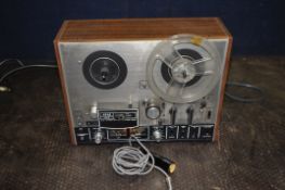 AN AKAI 4000DS Mk2 VINTAGE REEL TO REEL PLAYER, with a walnut effect case (PAT fail due to