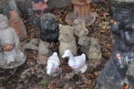 EIGHT CONCRETE AND PLASTER ANIMAL GARDEN FIGURES, including a pair of squirrels 25cm high, a westie,