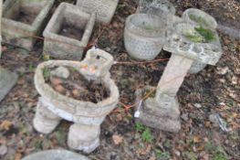 TWO BRICKWORK EFFECT GARDEN STRUCTURES, including a water feature with a spout and bowl on a pair of