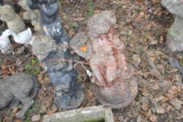 TWO CONCRETE GARDEN FIGURES, in the form of a lady carrying fruit baskets, height 72cm, and a