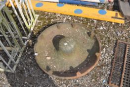A CAST IRON PIG FEEDER, 75cm in diameter. Condition Report: rust and losses