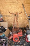 A VINTAGE HOWARD PETROL ROTAVATOR (spares or repairs. Condition report: pull string broken so