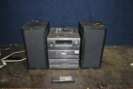 A DENON D-65 MINI COMPONENT HI FI SYSTEM with a pair of Mission 761i speakers (PAT pass and