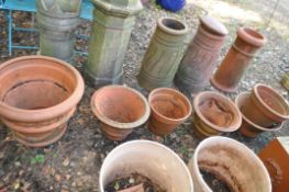 SIX LARGE TERRACOTTA PLANT POTS, the largest being 53cm in diameter. Condition Report: weathering