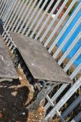 A CAST IRON TABLE BASE, with discoloured white marble top width 106cm, depth 61cm, height 71cm.