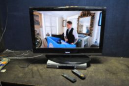 A TOSHIBA 32RV753 32in TV with remote and a JVC DVD player with remote (both PAT pass and