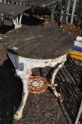 A VICTORIAN CAST IRON PUB TABLE, by Harper of Birmingham, with a more recent pine top, 61cm in